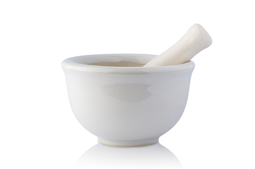 white mortar and pestle isolated on white background