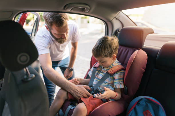 istock Father helping his son with the belts 1333895761
