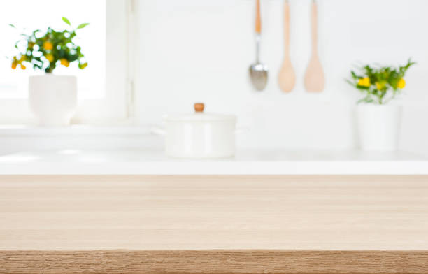 istock Tabletop on blur kitchen room background for montage product display 1333897396
