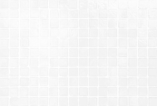 White tile wall chequered background bathroom texture. Ceramic brick wall and floor tiles mosaic background in bathroom and kitchen clean. Design pattern geometric with grid wallpaper decoration.