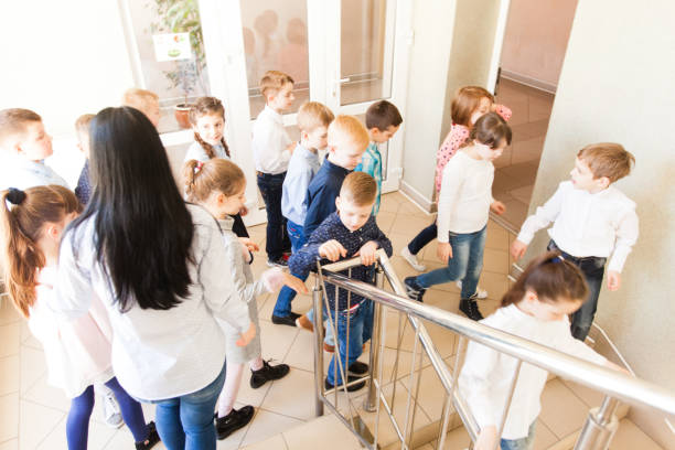 istock High Angle View Of Kids Walking In School 1333904912