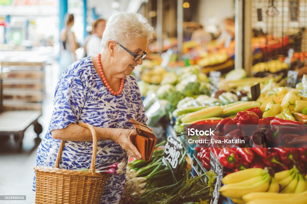 Senior woman in the city Farmer's Market Stock Photo