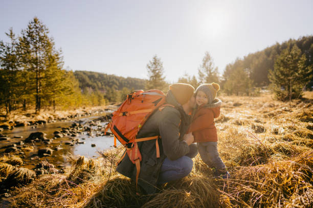 istock Smiling boy spending cold winter day outdoors with his father 1333916073