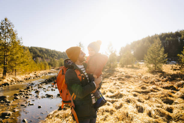 istock Smiling boy spending cold winter day outdoors with his father 1333916078