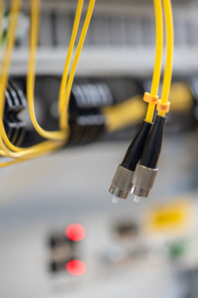istock Fiber optical patch cord cable used at installation high speed gigabit equipment in telecommunication 1333916166