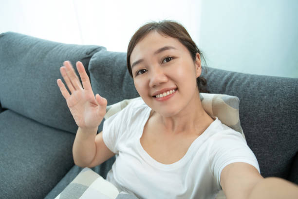 istock Woman using COVID-19 ag test kit. 1333917518