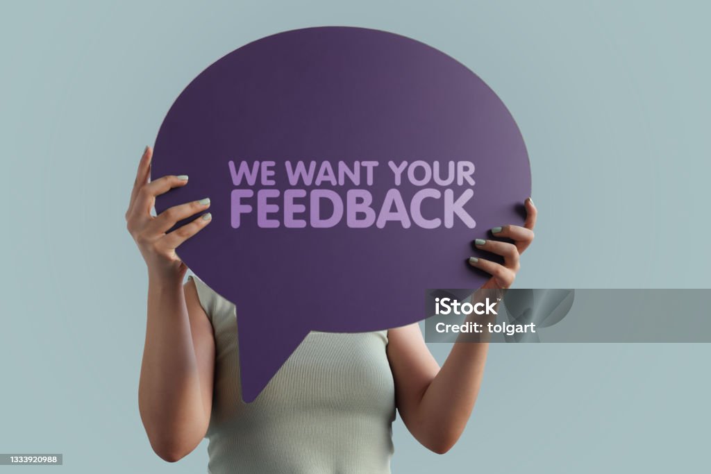 Wir wollen Ihr Feedback-Wort mit Sprechblase - Lizenzfrei Feedback- Kommunikation Stock-Foto