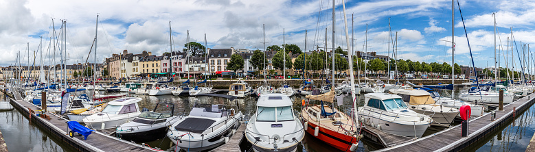 Vannes, France - July 27nd, 2021: Leisure boats moored in canal of the port panorama