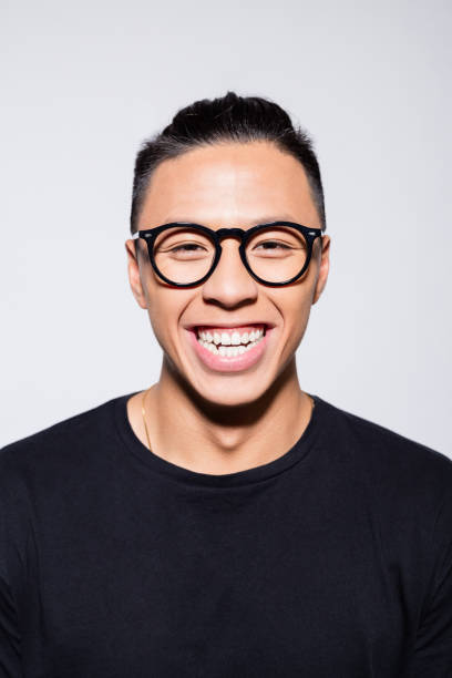 istock Excited asian young man in black clothes 1333924647