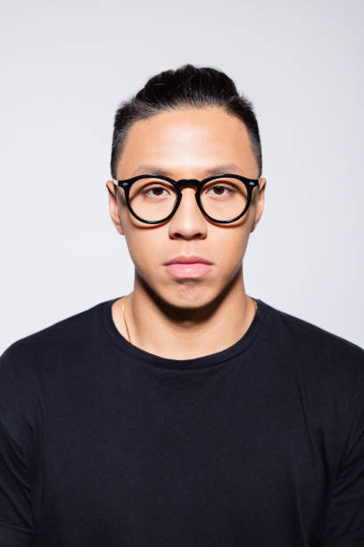 istock Worried asian young man in black clothes 1333925874
