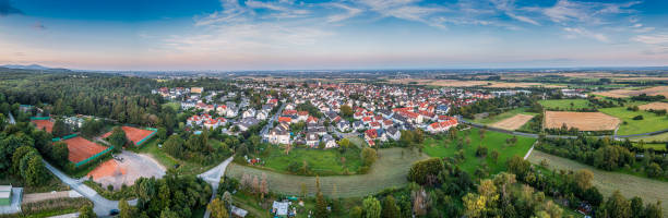 drone panorama over german southern hessian settlement diedenbergen near wiesbaden in evening light - frankfurt german culture night city imagens e fotografias de stock