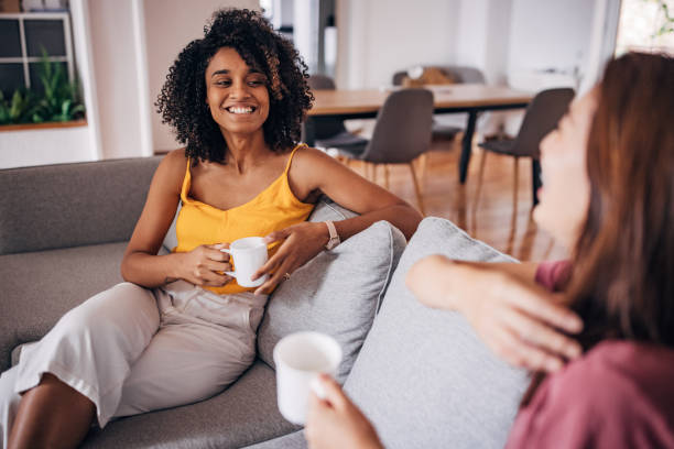 istock Two women drinking coffee at home 1333926404