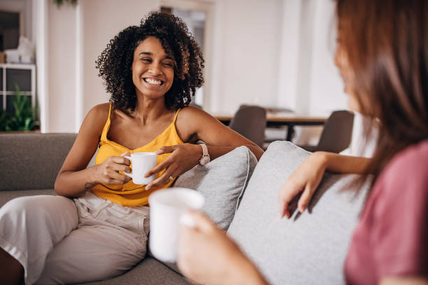 istock Two women drinking coffee at home 1333926961