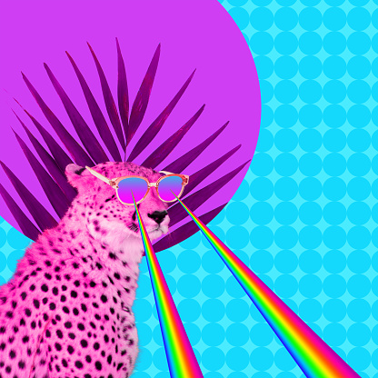 Creative composition with pink cheetah in sunglasses emitting a rainbow from its eyes over light blue background. Summer mood, vacation, holiday concept. Copyspace for ad.