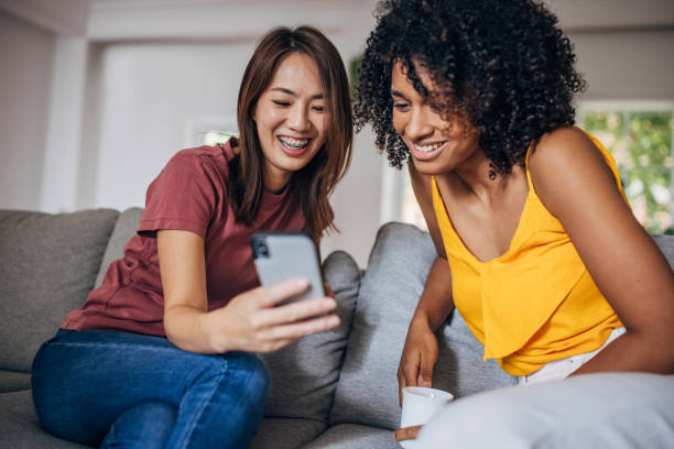 istock Two women relaxing at home 1333928645