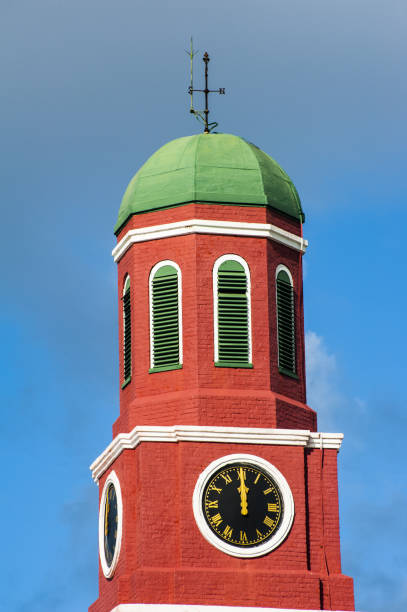 Famous red clock tower on the main guardhouse at the Garrison Savannah. UNESCO garrison historic area Bridgetown, Barbados