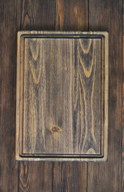 istock textured wooden cutting board for cooking 1333933135