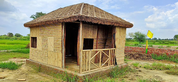 Chaumuhan, Mathura, India - August 5, 2021: Beautiful bamboo cottage built in a Deserted rural area of Utter Pradesh.