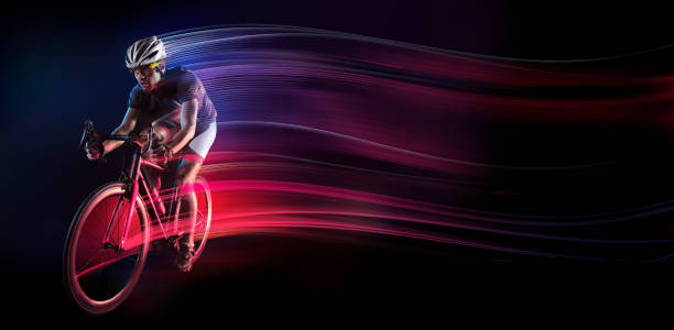 istock Sport. Athlete cyclists in silhouettes on dark background 1333935738