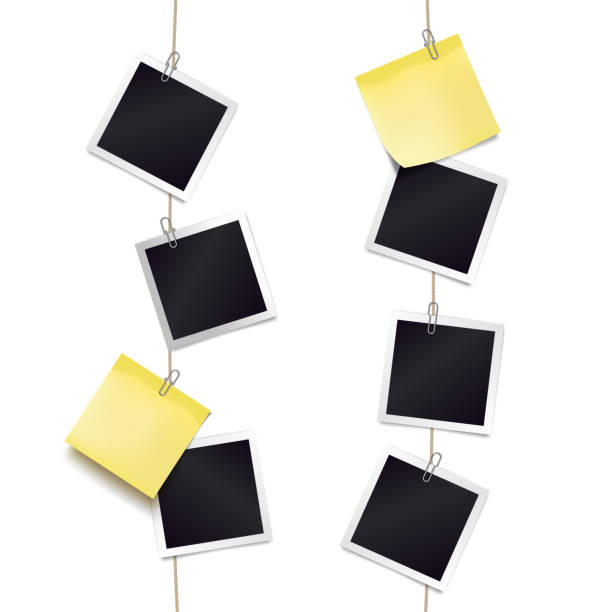 istock Yellow sticky notes and photo frames attached metal paper clips on tapes. Template for design. Vector illustration. 1333936172