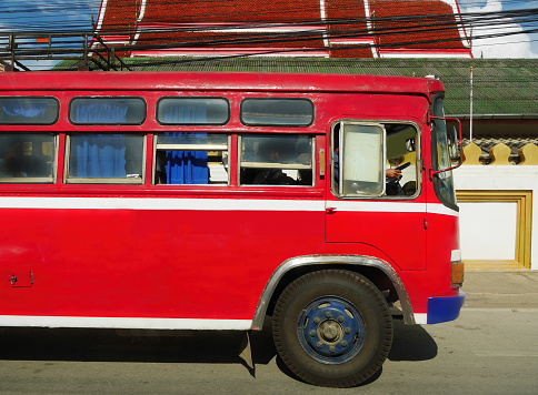 red transportaion public local bus in luang prabang laos