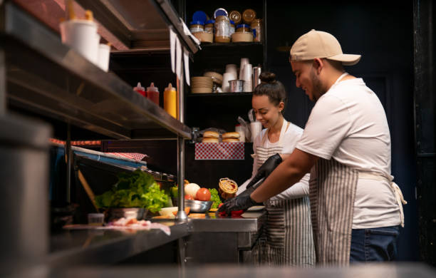 istock Cooks working at a fast food restaurant 1333944297