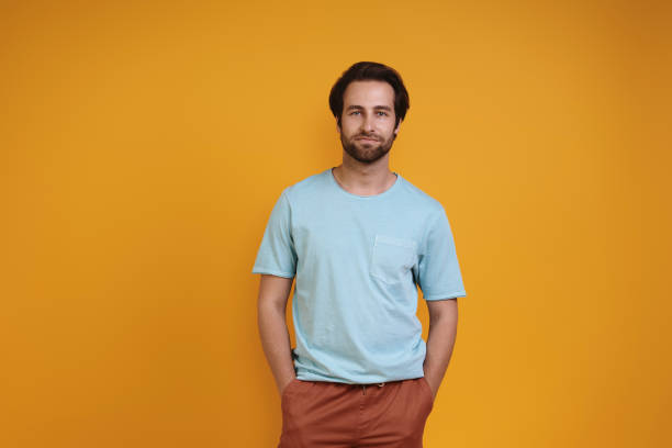 istock Handsome young man in casual clothing looking at camera 1333948502