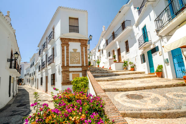 Picturesque town of Frigiliana located in mountainous region of Malaga, Andalusia, Spain Picturesque town of Frigiliana located in mountainous region of Malaga, Costa del Sol, Andalusia, Spain nerja stock pictures, royalty-free photos & images