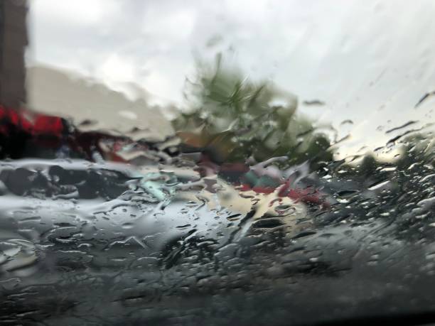 istock Cars Silhouettes through the rain 1333950982