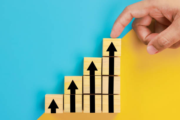 istock wooden block cube stacking as step stair. Business concept growth success process 1333956583
