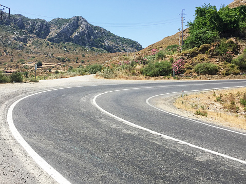 A winding mountain asphalt road
