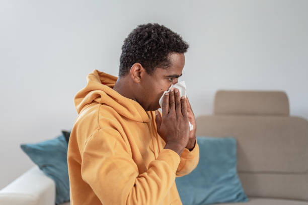 istock Adult man blowing nose 1333957529
