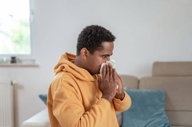 istock Adult man blowing nose 1333957530