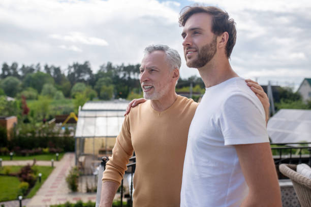 istock Dad and son spending weekend at the country side and looking happy 1333958483