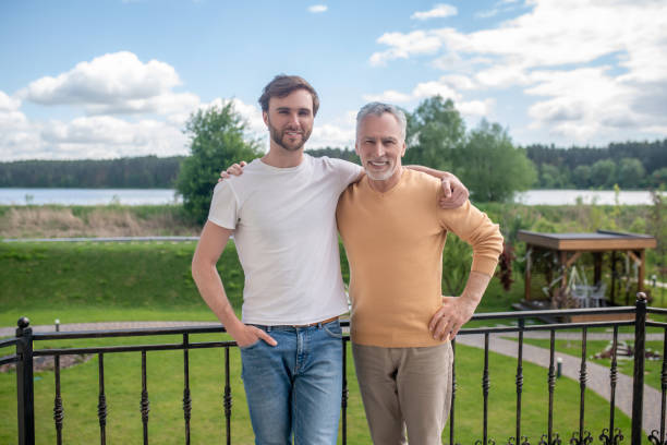 istock Dad and son spending weekend at the country side and looking enjoyed 1333958489