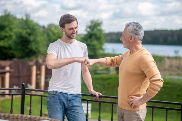 istock Dad and son spending weekend at the country side and looking enjoyed 1333958493