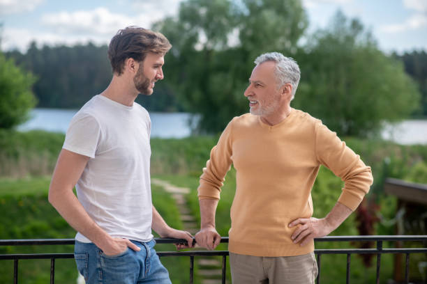 istock Dad and son spending weekend at the country side and looking enjoyed 1333958498