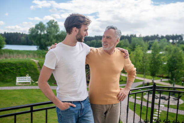 istock Dad and son spending weekend at the country side and looking enjoyed 1333958499