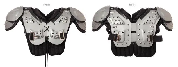 Photo of American football shoulder pads with front and back views isolated on white background