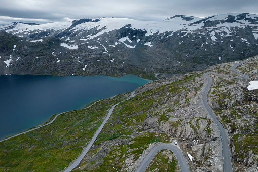 Cars with Tourists on the Scenic Alpine Route Near Famous Geiranger, Vestland County, Norway. Aerial View.