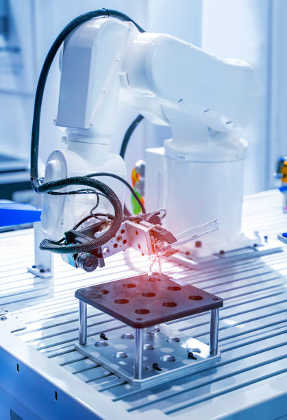 istock Robot arm with test tube with biological sample in science laboratory 1333961721