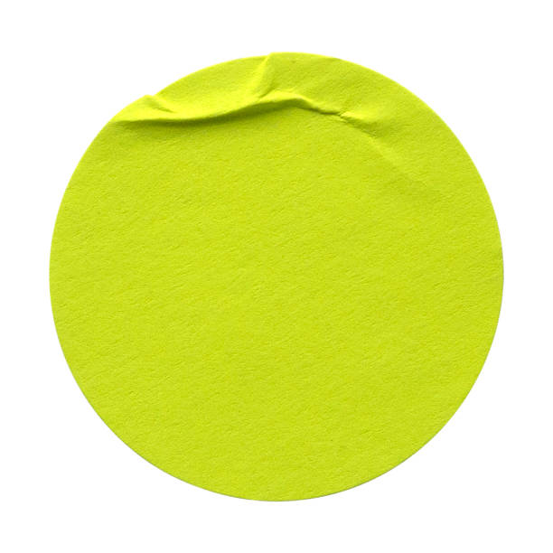 istock Green circle paper sticker label isolated on white background. 1333963875