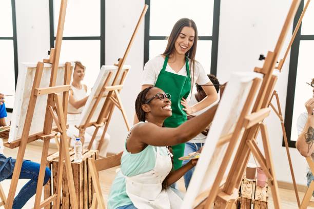 istock Group of people smiling happy drawing at art studio. 1333966017