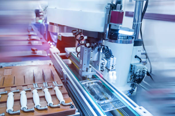 istock robot gripping and smart robot working on smart door handle ,industry 4.0 and technology. 1333966486