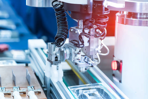 istock robot gripping and smart robot working on smart door handle ,industry 4.0 and technology. 1333966488