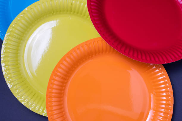 istock coloured paper barbecue plates on a dark background 1333967584