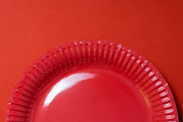 istock coloured paper barbecue plates on a dark background 1333967711