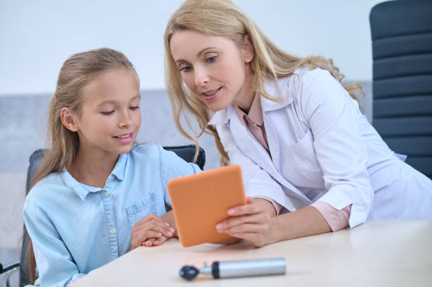 istock Pediatric patient consulting an experienced female audiologist 1333968183