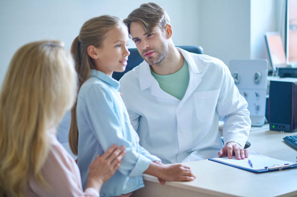 istock Doctor analyzing the condition of the patients external auditory canal 1333968194