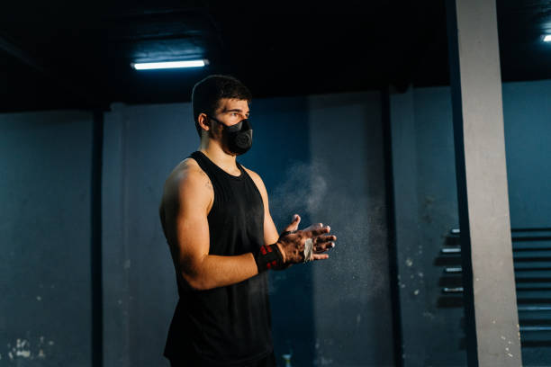 istock Athlete wearing mask with chalk in hand 1333972933